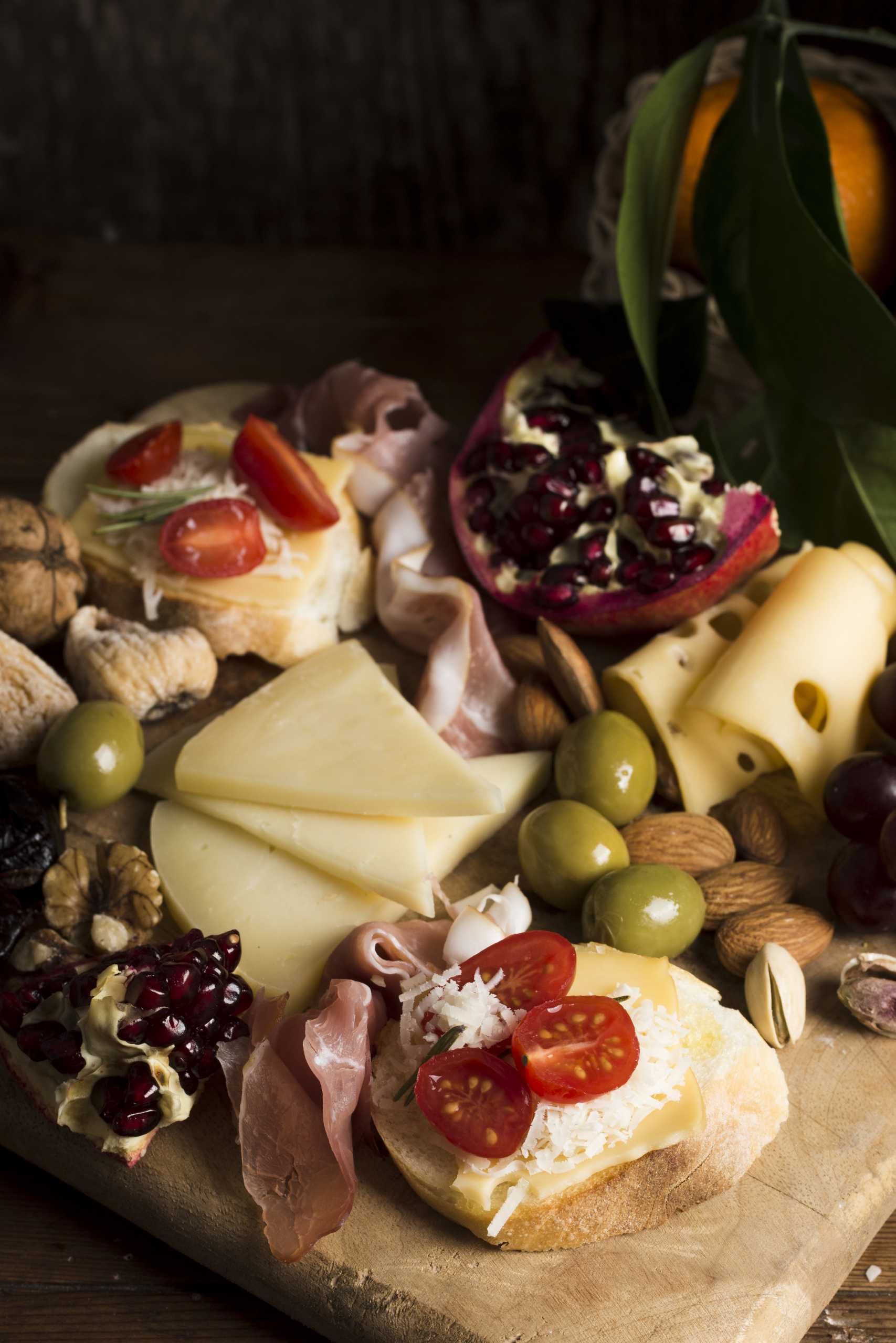delicious-cheese-with-tomatoes-composition-table